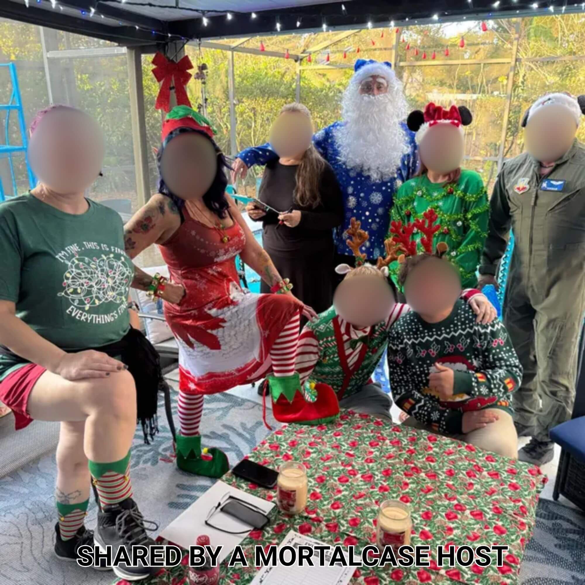 Guests dressed as Santa, elves and Christmas characters while playing Who Killed Santa’s Wife?