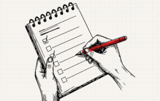 Hands checking boxes in a spiral notebook with a red pen for a murder mystery party planning checklist.